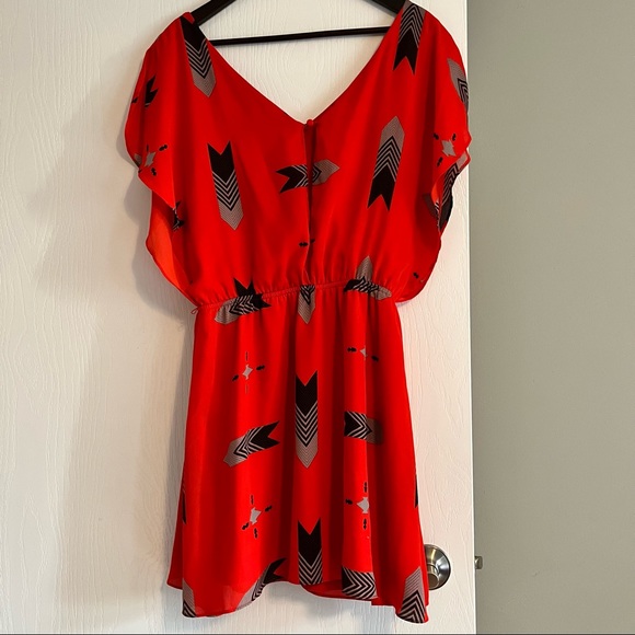 Contemporary red’ish orange dress that is line and has a bloused overlay. - Picture 4 of 4